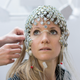 A non-invasive electroencephalography (EEG) cap is for measuring brain activity on a study participant. (Image: Wyss Center)